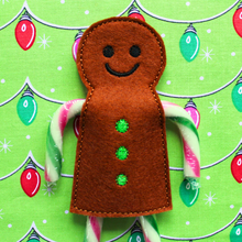 Load image into Gallery viewer, Gingerbread boy candy cane holder in brown felt with green buttons