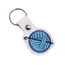 Load image into Gallery viewer, Crochet keyfob with blue wool and chrome rivet and split ring
