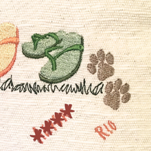 Load image into Gallery viewer, Flip flops family cushion close up of pawprints