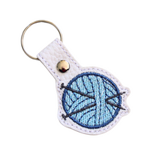 Load image into Gallery viewer, Knitting keyfob with blue yarn and chrome rivet and split ring
