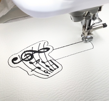 Load image into Gallery viewer, Musical notes keyfob being stitched