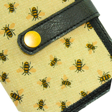 Load image into Gallery viewer, Bumblebee notebook with mini bumblebees on beige fabric backed with black faux leather and a gold fastener
