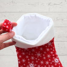 Load image into Gallery viewer, Snowflake Christmas stocking in red with white lining