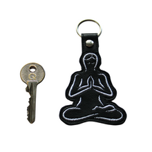 Load image into Gallery viewer, Yoga stitching in black faux leather with key for size comparison