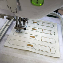 Load image into Gallery viewer, Wine Bottle key fobs in progress