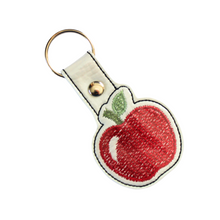 Load image into Gallery viewer, Apple keyfob with black border
