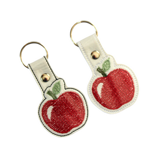 Apple keyfobs with black or white outlines