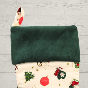 Christmas motifs stocking with green cuff
