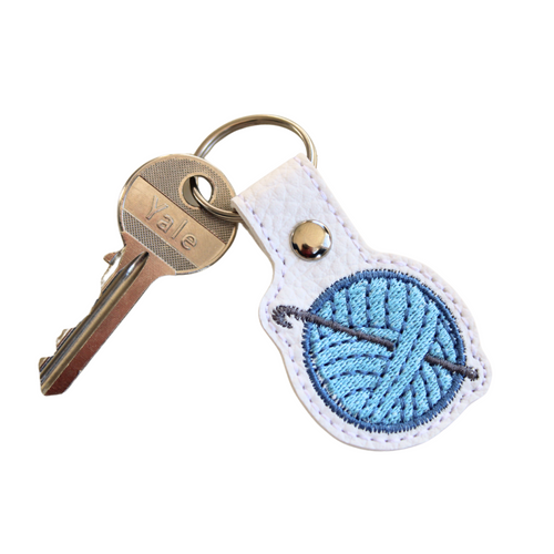 Crochet keyfob with blue wool and key