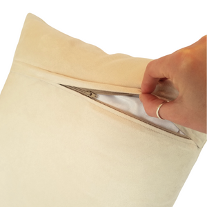 Cushion reverse in barley with zip opening partially unzipped