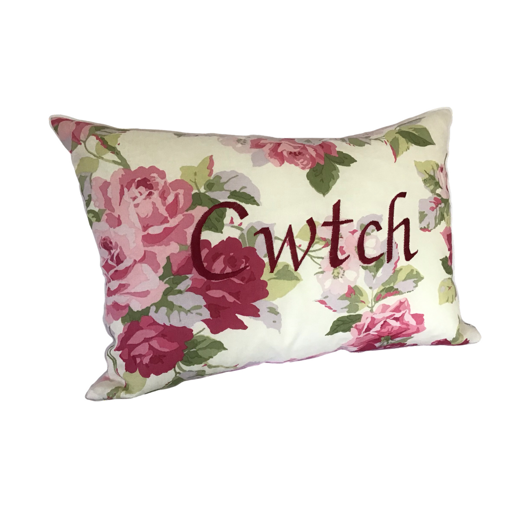Cwtch cushion on Laura Ashley pink floral left side view