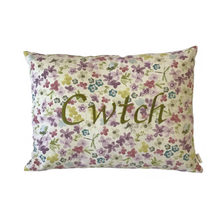 Load image into Gallery viewer, Cwtch cushion stitched in green on floral fabric
