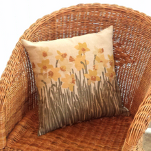 Load image into Gallery viewer, Daffodil cushion on a chair
