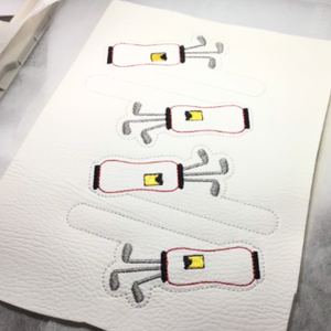 Golf bag keyfobs completed stitching