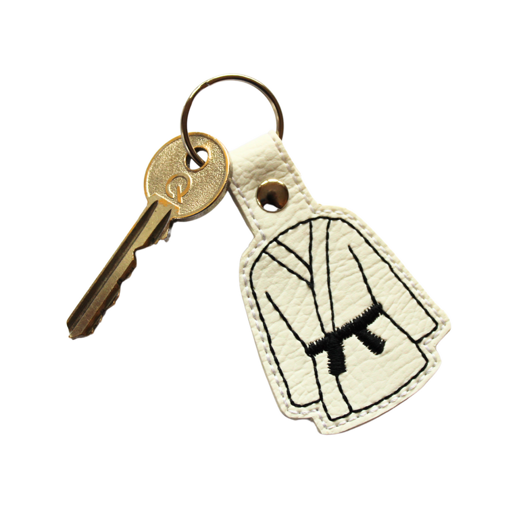 Karate keyfob with black belt and key attached