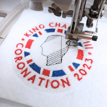 Load image into Gallery viewer, King Charles Coronation Keepsake Hanger being stitched
