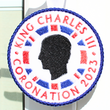 Load image into Gallery viewer, King Charles Coronation Keepsake Hanger on door handle close up
