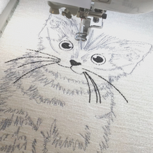 Load image into Gallery viewer, Kitten with glasses embroidery in progress
