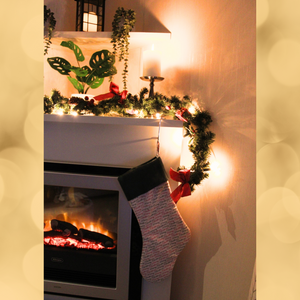 Merry Christmas stocking hanging over a fireplace
