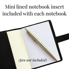 Load image into Gallery viewer, Open notebook with lined page and silver pen on a white paper, text indicating mini lined notebook insert included.
