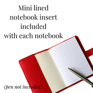 Open notebook with lined page and silver pen on a white paper, text indicating mini lined notebook insert included.