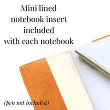 Load image into Gallery viewer, Open notebook with lined page and silver pen on a white paper, text indicating mini lined notebook insert included.
