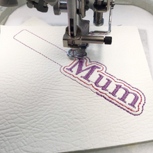 Load image into Gallery viewer, Mum keyfob being stitched
