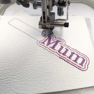 Mum keyfob being stitched