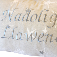 Load image into Gallery viewer, Nadolig Llawen cushion in silver close up of stitching
