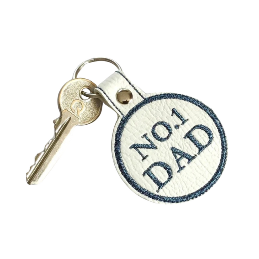 No.1 Dad keyfob with blue thread on white faux leather with key