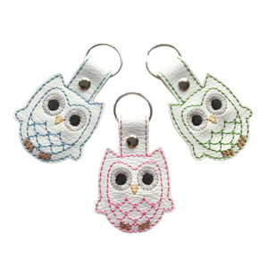 Owl keyfobs in blue, pink and green on white faux leather with metal rivet and split ring