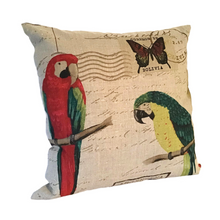 Load image into Gallery viewer, Parrot cushion with one red parrot and one green and yellow parrot
