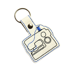 Sewing machine keyfob with blue thread