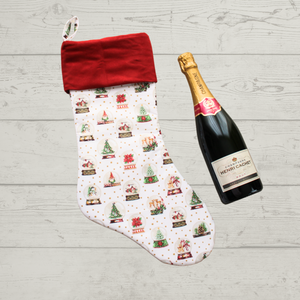 Snow globe Christmas stocking with a champagne bottle