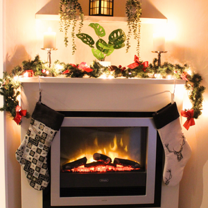 Stag Christmas Stocking hanging from a mantlepiece