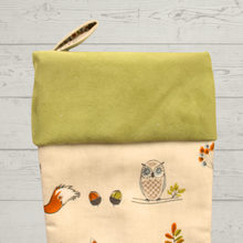 Load image into Gallery viewer, Woodland themed Christmas stocking with green cuff
