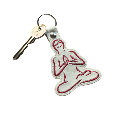 Yoga keyfob-on-white-faux-leather-with-key