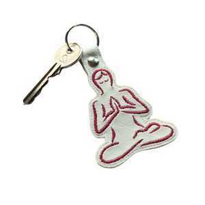 Yoga keyfob-on-white-faux-leather-with-key