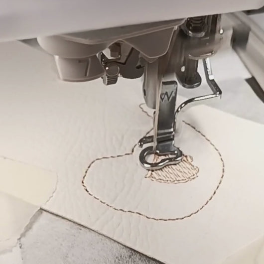 Chicken keyfob video of wing being stitched