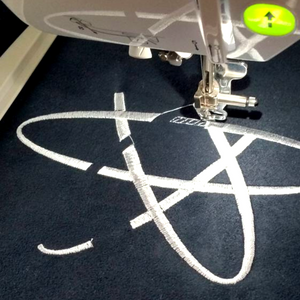 Atom cushion being stitched