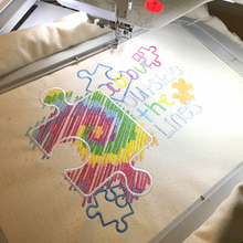 Load image into Gallery viewer, Autism Jigsaw Cushion stitched in the hoop
