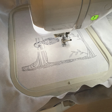 Load image into Gallery viewer, Cats on a Branch embroidery in progress
