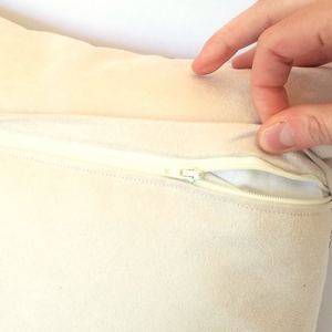 Cushion reverse in cream with zip opening