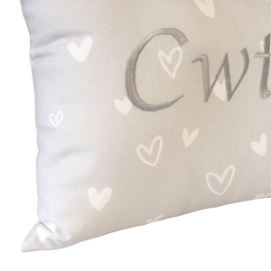 Cwtch Cushion silver hearts left close up