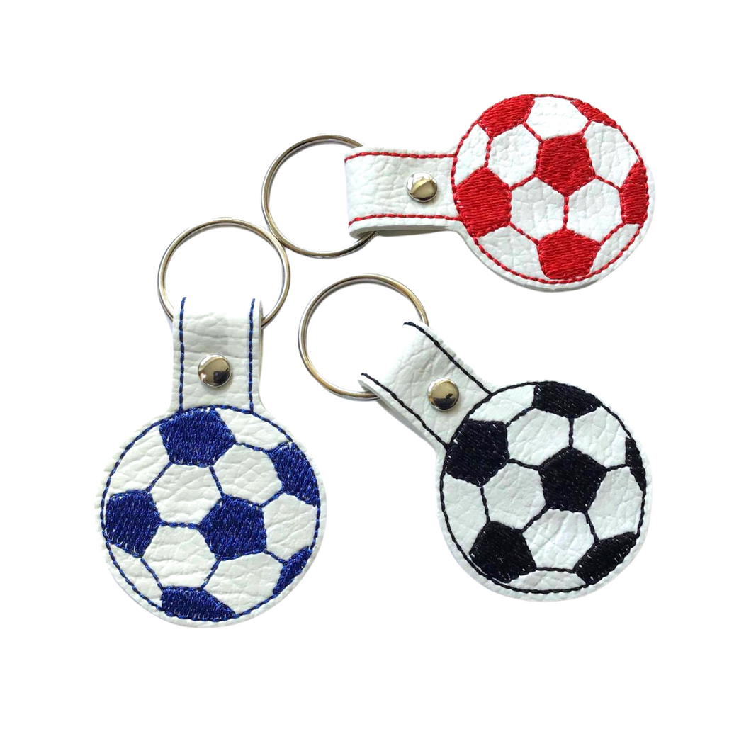 Football keyfobs in blue, black and red