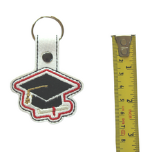Load image into Gallery viewer, Graduation key fob size guide
