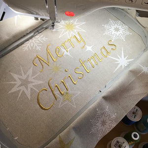 Merry Christmas with gold stitching in the hoop