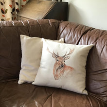 Load image into Gallery viewer, Stag Watercolour Cushion on sofa
