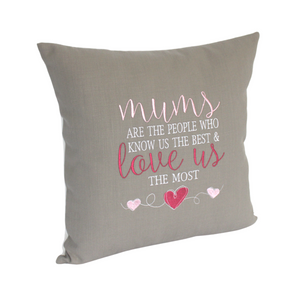 Mums Love Us the most embroidered cushion text stitched in white, light pink and dark pink on grey fabric viewed from the left side