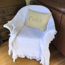 Load image into Gallery viewer, Cwtch Cushion yellow daisy on chair
